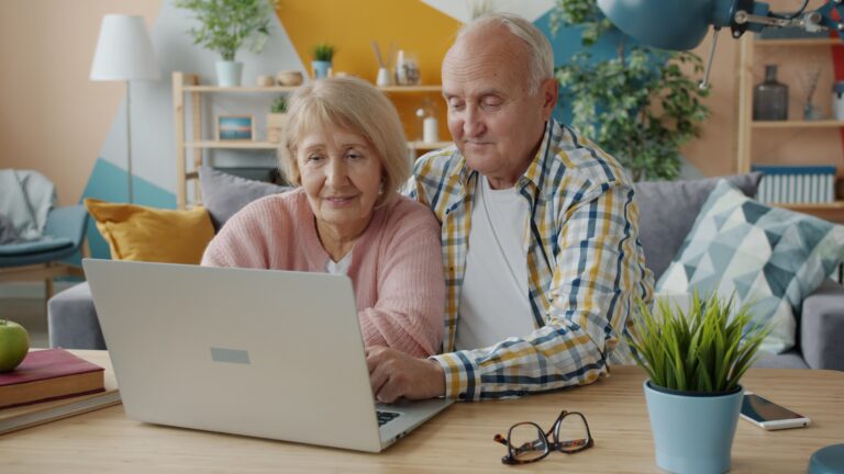 Vero Senior Support Couple on MacBook Laptop